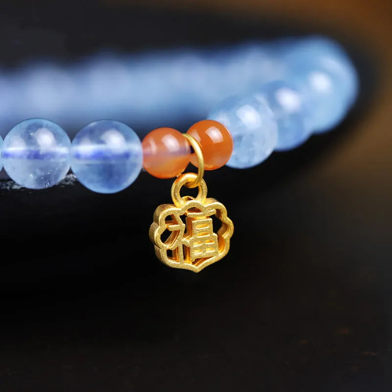 Ice translucent aquamarine crystal bracelet with 8mm round beads and sequin elements