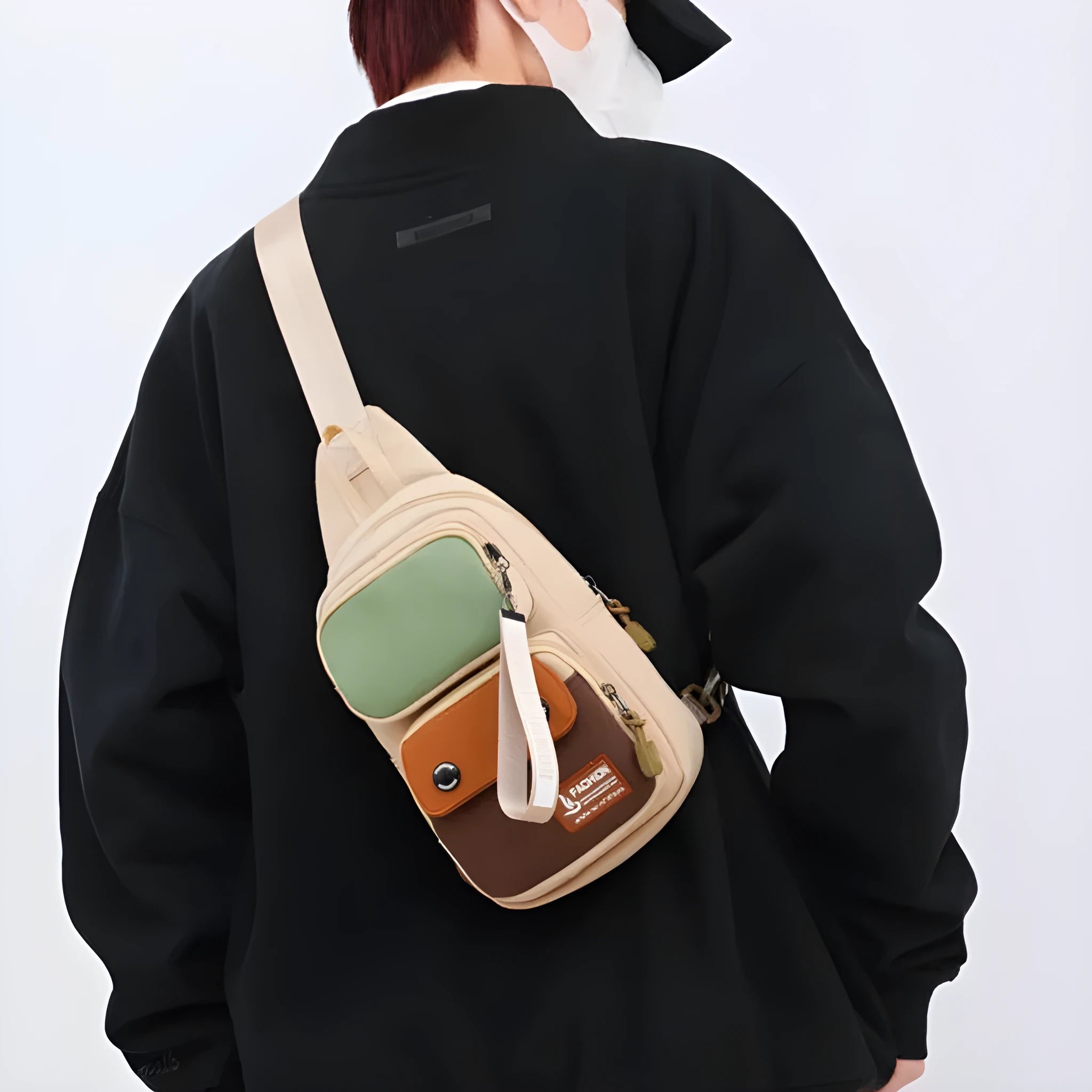 Nylon crossbody shoulder bag with contrast colour options and letter pattern detailing
