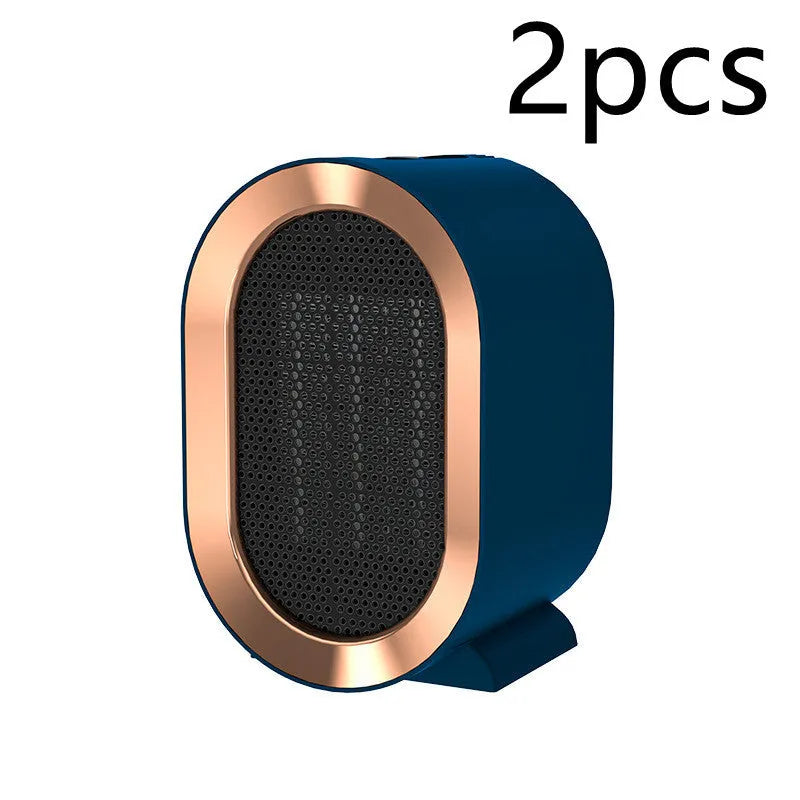 Desktop electric ceramic heater in various colours with mechanical controls and compact portable design