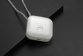 Mini USB air purifier necklace in pink, showing compact dimensions and wearable design.