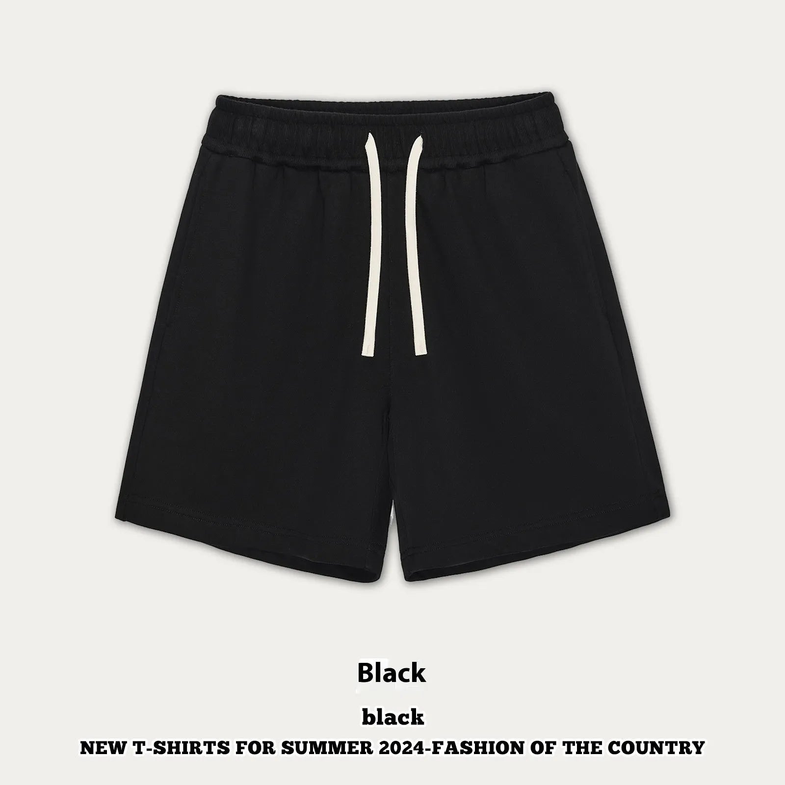 Baby boy and girl wearing loose-fit cotton denim shorts in charcoal grey and cream apricot colours.