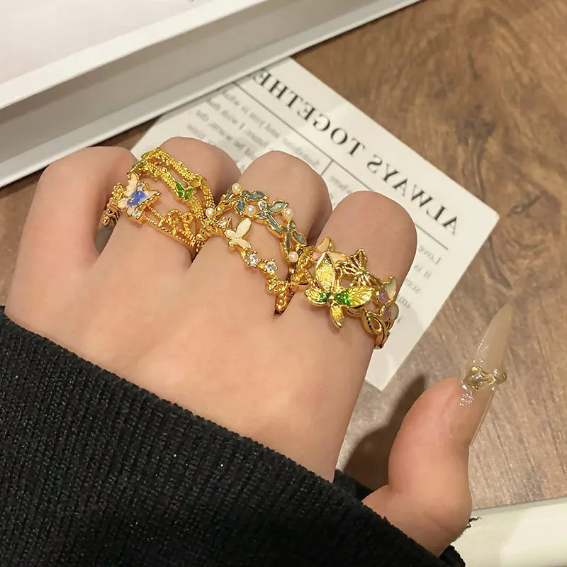 Copper butterfly women's ring with open loop design and Chinese-inspired creative jewellery details