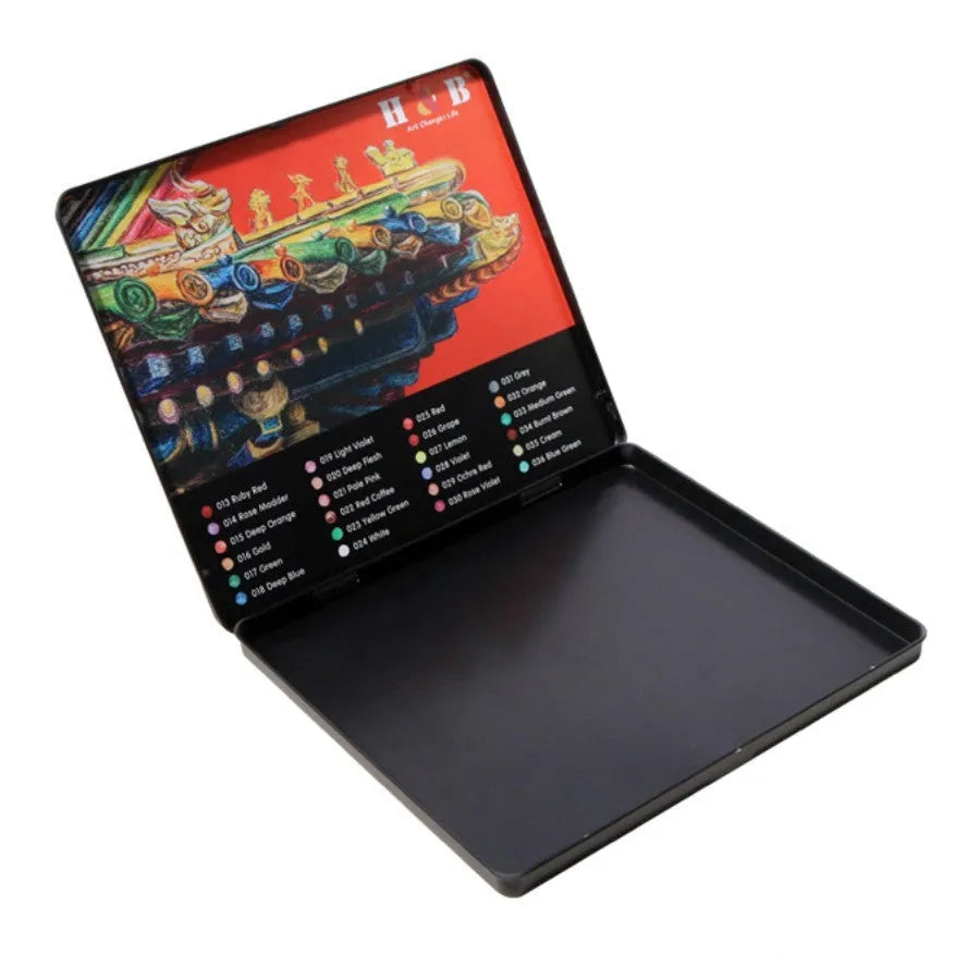 Metal tin box open to show 24 water-soluble coloured pencils in various colours