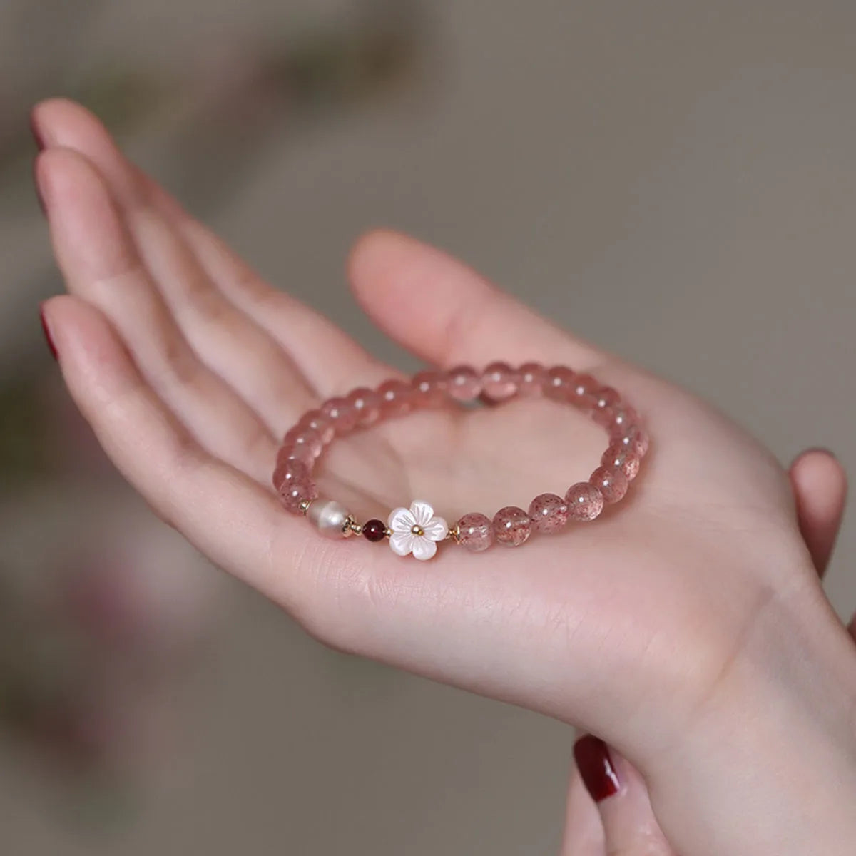 Strawberry quartz peach blossom bracelet with flower-shaped beads and silver-plated adjustable fittings