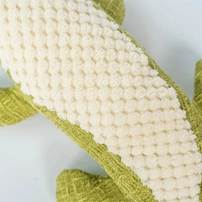 Corn grid textured plush pet toy in blue, green and red colours with biting sound feature