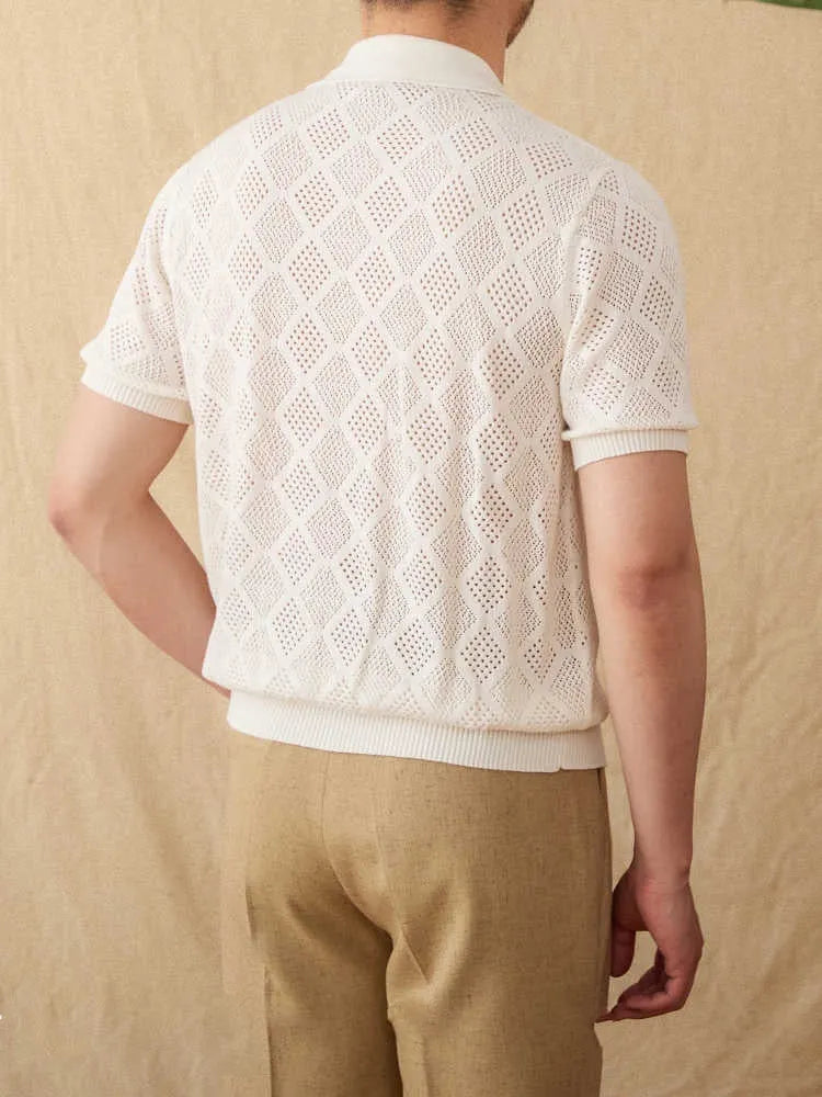 Light brown zip-front cotton cardigan with a lapel collar and short sleeves.