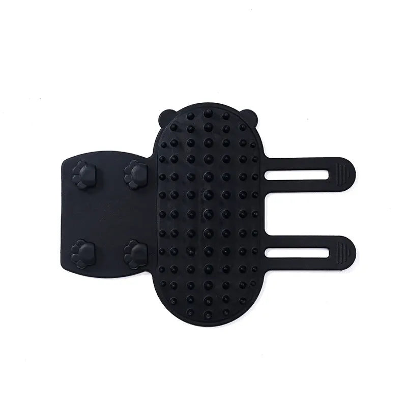 Silicone pet grooming comb with adjustable strap mounted on table leg for cats and dogs