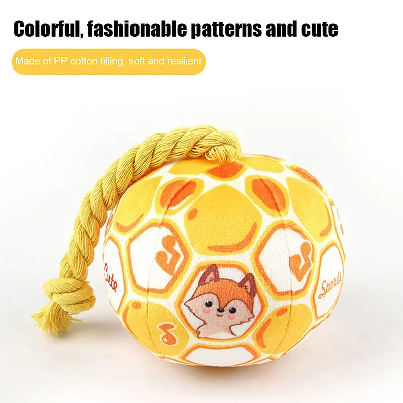 Blue and yellow cartoon elastic football dog toy made from cotton rope for tug of war and chewing.