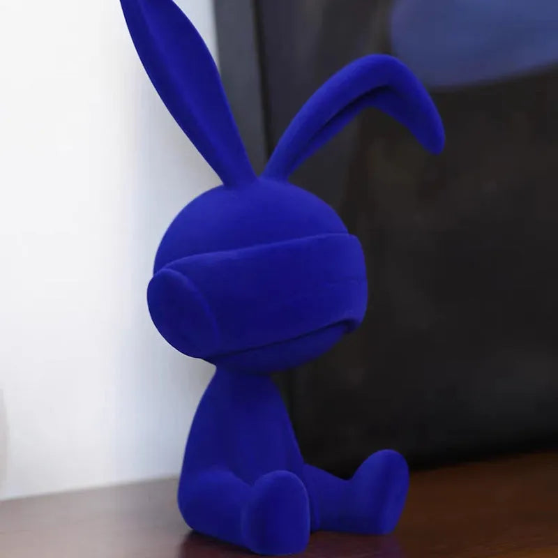 Suede blindfold rabbit resin table ornament in green, blue, or red colour options