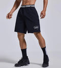 Men's black elastic waist sports shorts with cropped length for workouts