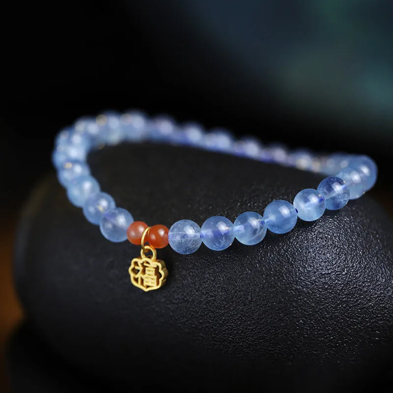 Ice translucent aquamarine crystal bracelet with 8mm round beads and sequin elements