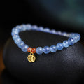 Ice translucent aquamarine crystal bracelet with 8mm round beads and sequin elements