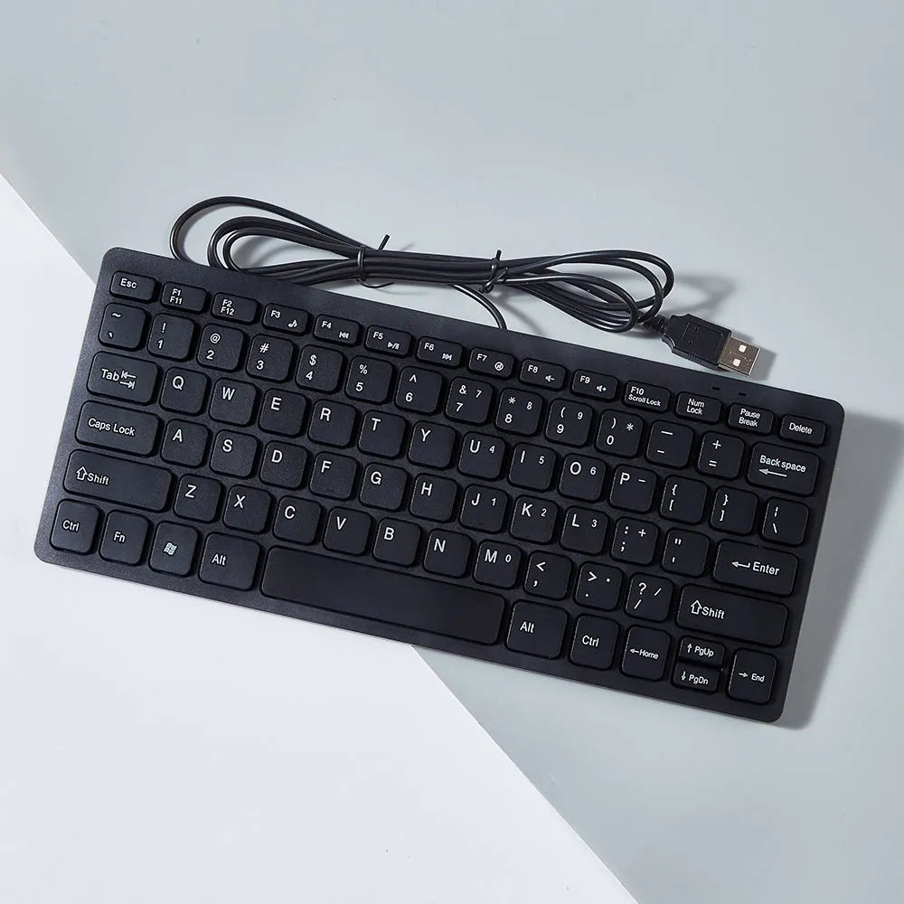 USB wired mini keyboard in black, white, pink, and blue colours with compact design