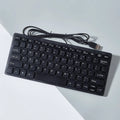 USB wired mini keyboard in black, white, pink, and blue colours with compact design
