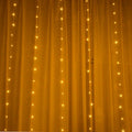 Copper curtain Christmas lights with LED beads in blue colour, showing romantic star lights effect for holiday decoration