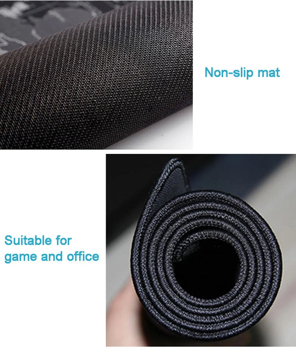 Large grey cloth desk pad with custom cartoon print, showing keyboard and mouse on its non-slip rubber base.