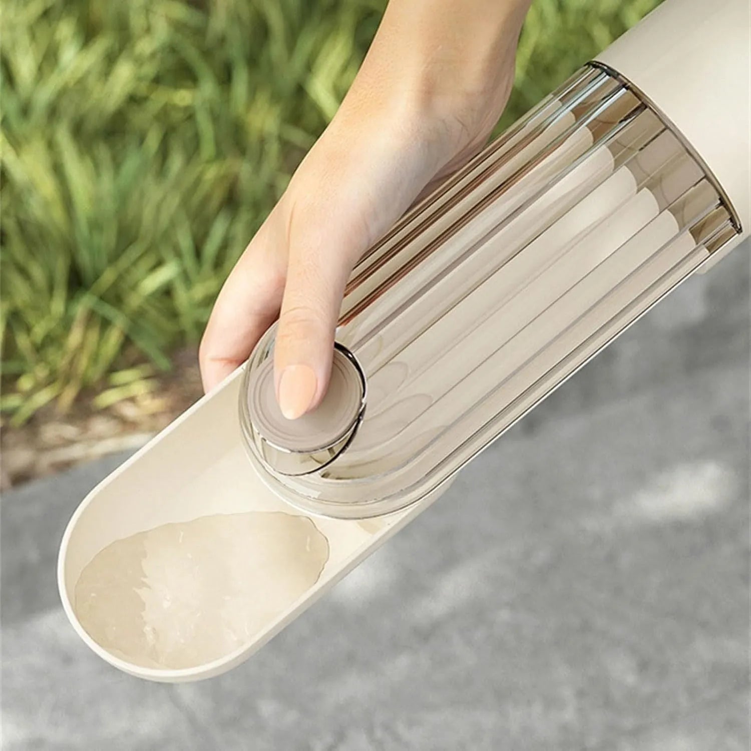 Beige or green folding portable dog water bottle with food dispenser, shown in open and closed positions.
