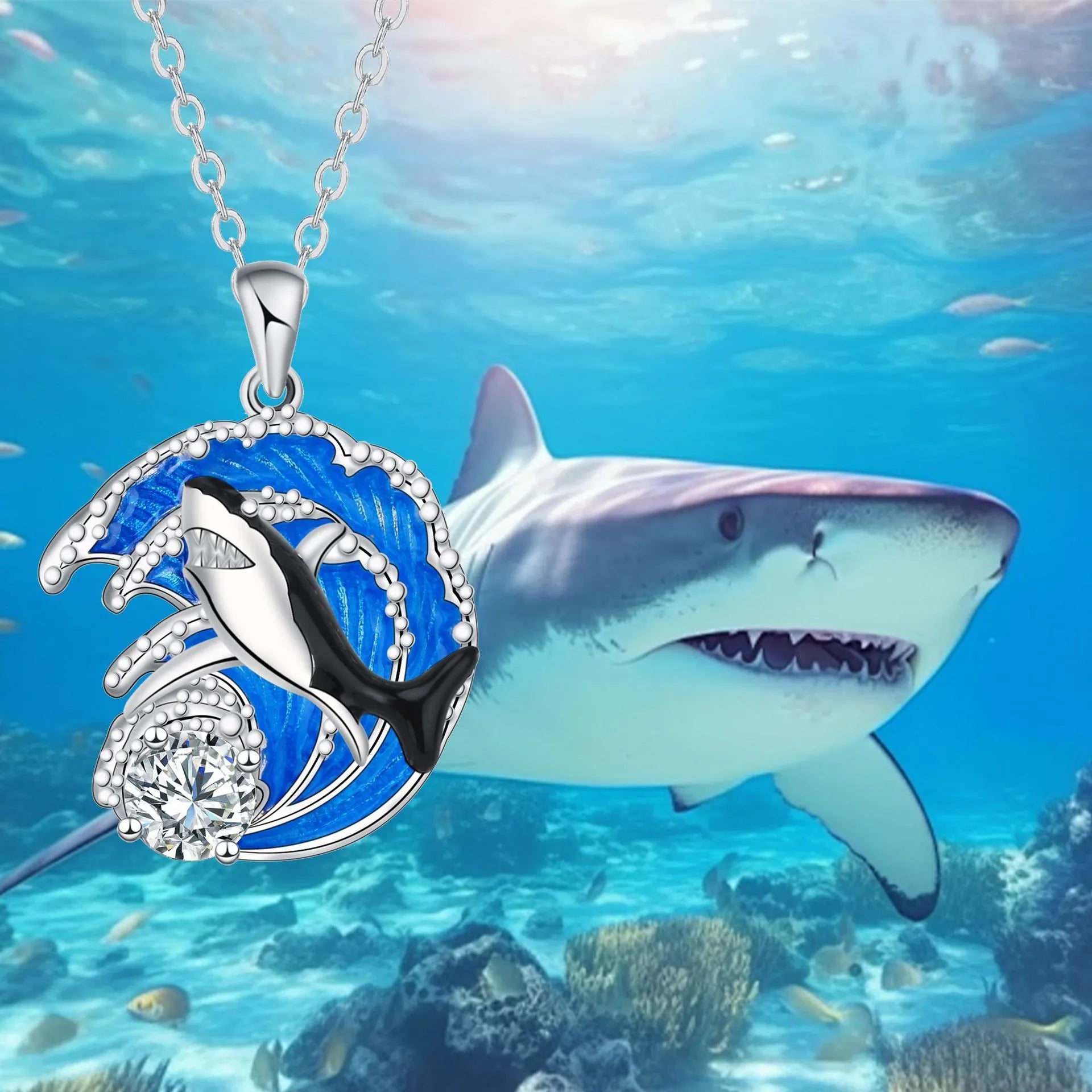 Copper shark pendant necklace with electroplated finish and adjustable cross chain measuring 41cm to 50cm