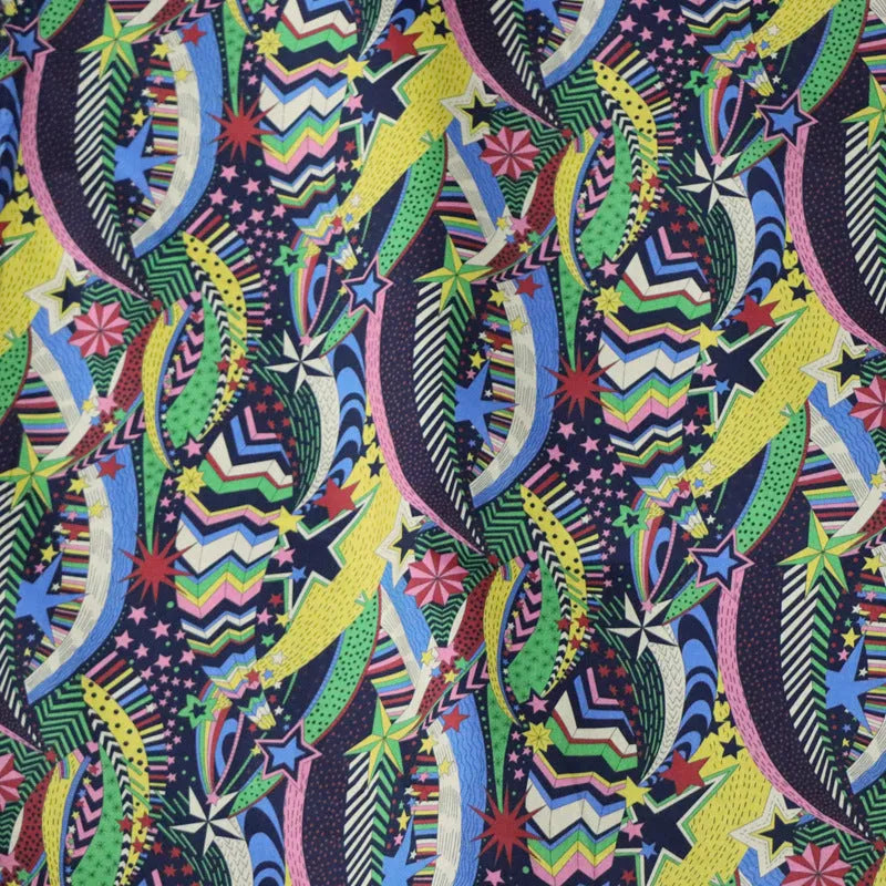 Blue cotton fabric with digital floral printing showing plant designs