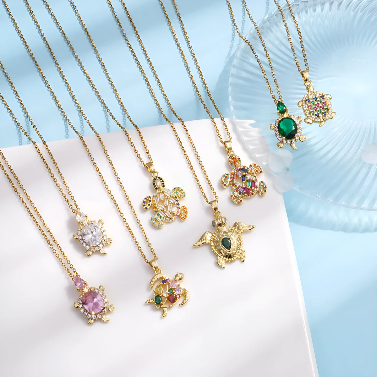 Gold-plated copper sea turtle necklace with zirconium-encrusted inlay on a titanium steel O-link chain