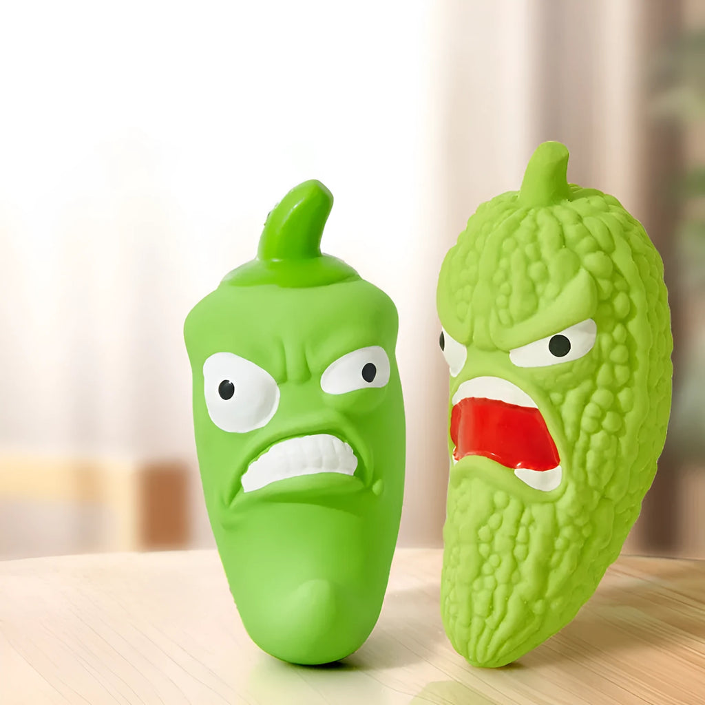 Bitter melon shaped or chili shaped durable plastic dog chew toy with textured surface for teeth cleaning.