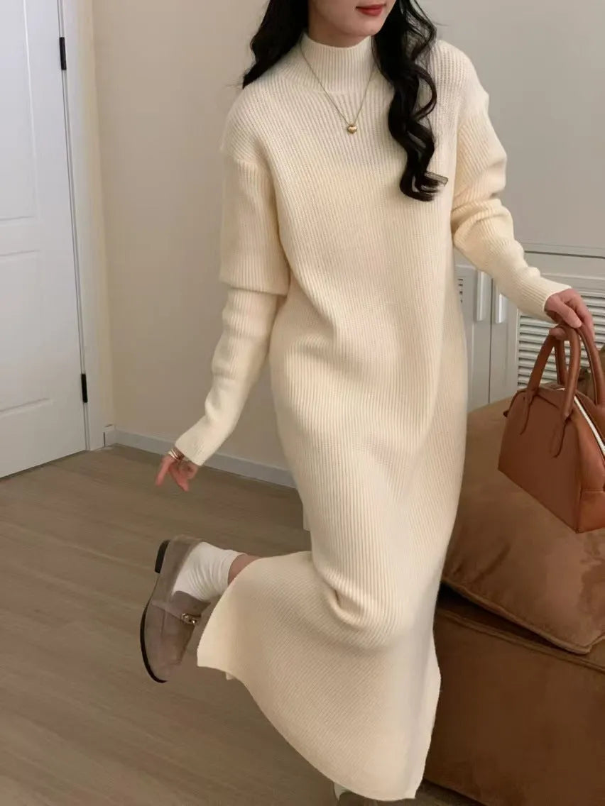 Half turtleneck acrylic knitted dress in midi length with long sleeves and high waist