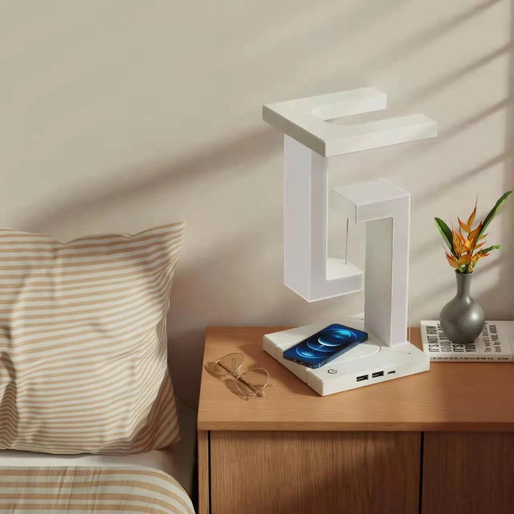 White magnetic suspension table lamp with wireless charging, touch switch, USB power, 12 x 12 x 22 cm, floating light design.