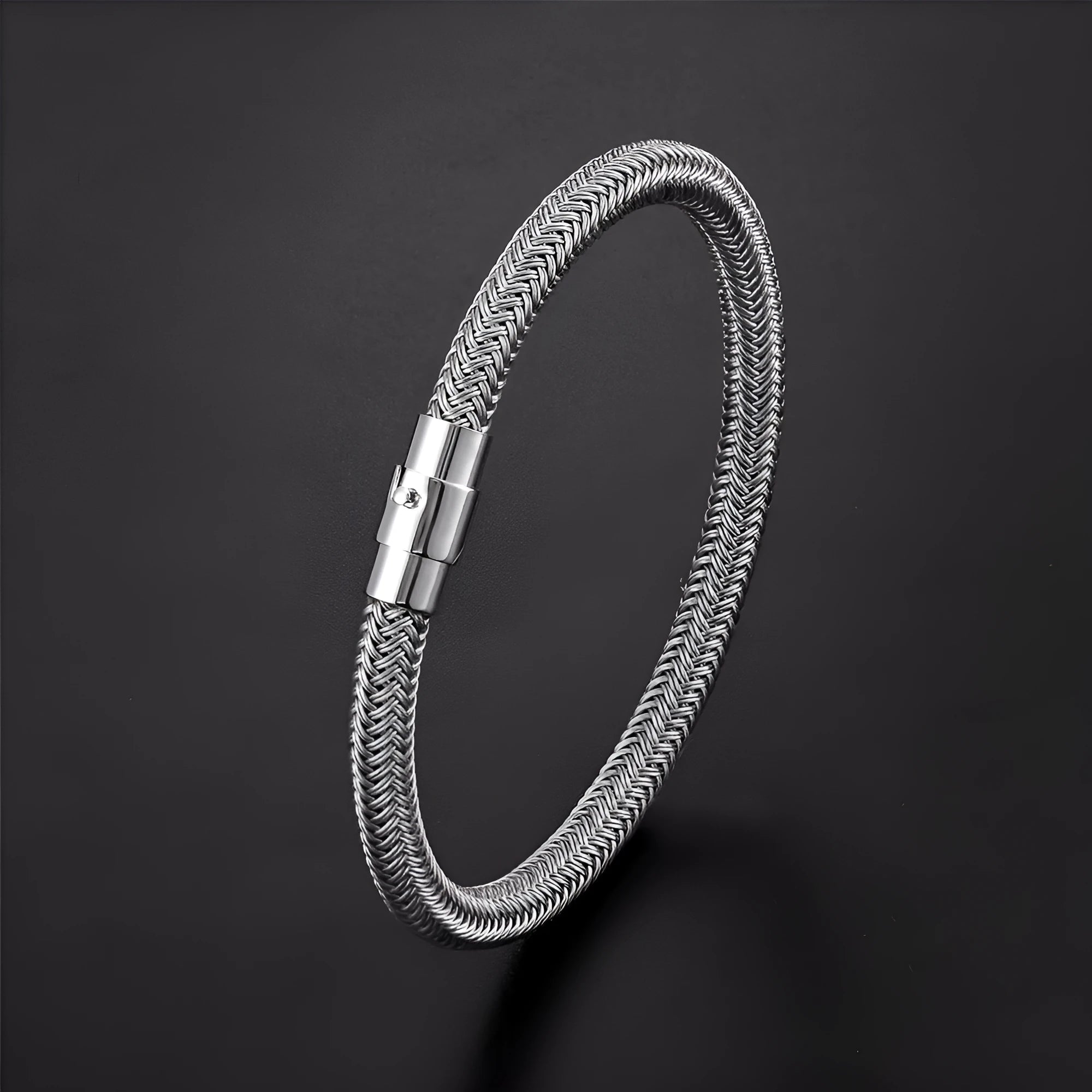 Titanium steel wire bracelet with magnetic clasp in geometric design showing line patterns