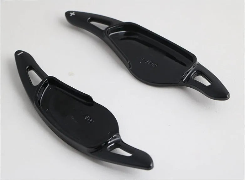 Carbon fibre look steering wheel paddle shift replacements for car interior modification