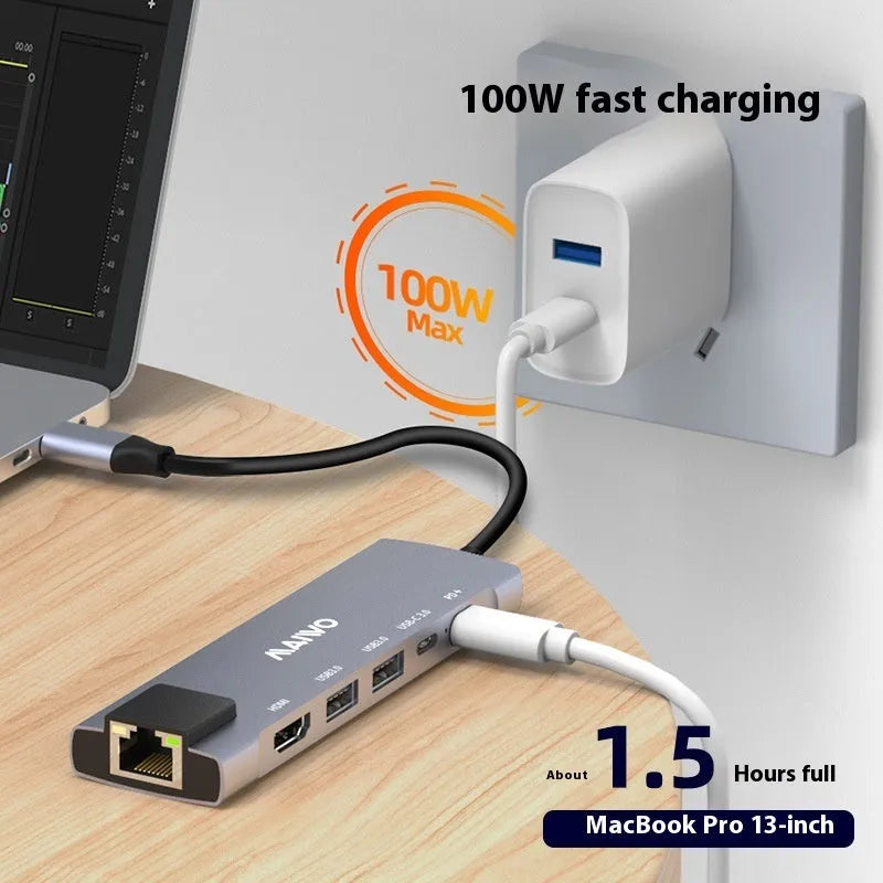 Aluminium Steam Deck docking station with HDMI, Ethernet, and USB ports on a desk