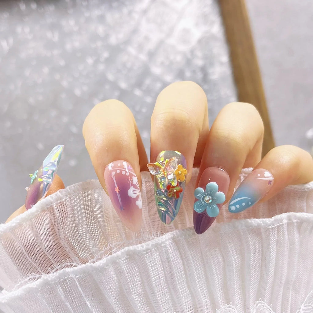 Handmade colourful 3D nail art sculptures of flowers and butterflies in four sizes XS S M L.
