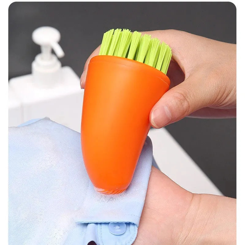 White and orange carrot-shaped nylon cleaning brush for kitchen use