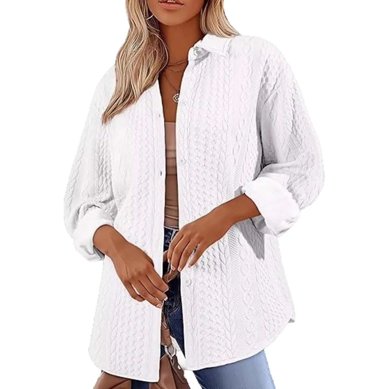 Women's solid colour knitted cardigan sweater in black, shown open over a top.