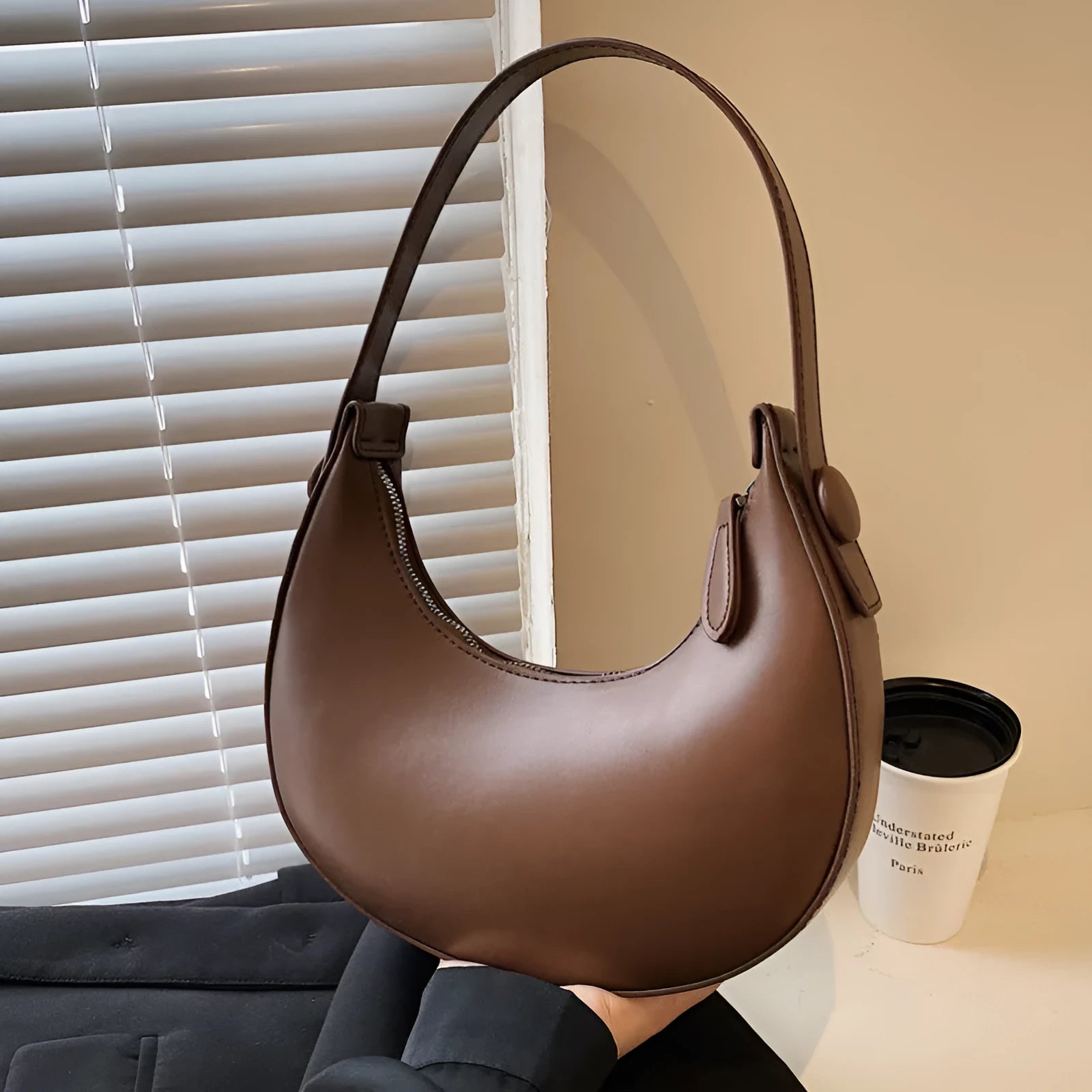 Women's PU dumpling shape shoulder bag in retro brown with zipper compartment, measuring 21x20x6cm