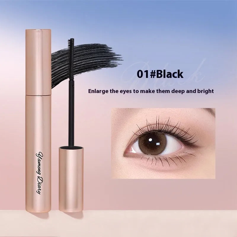 Long curling mascara tube in black or brown with long-lasting setting formula