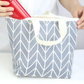 Arrow print waterproof polyester makeup bag for cosmetic storage.