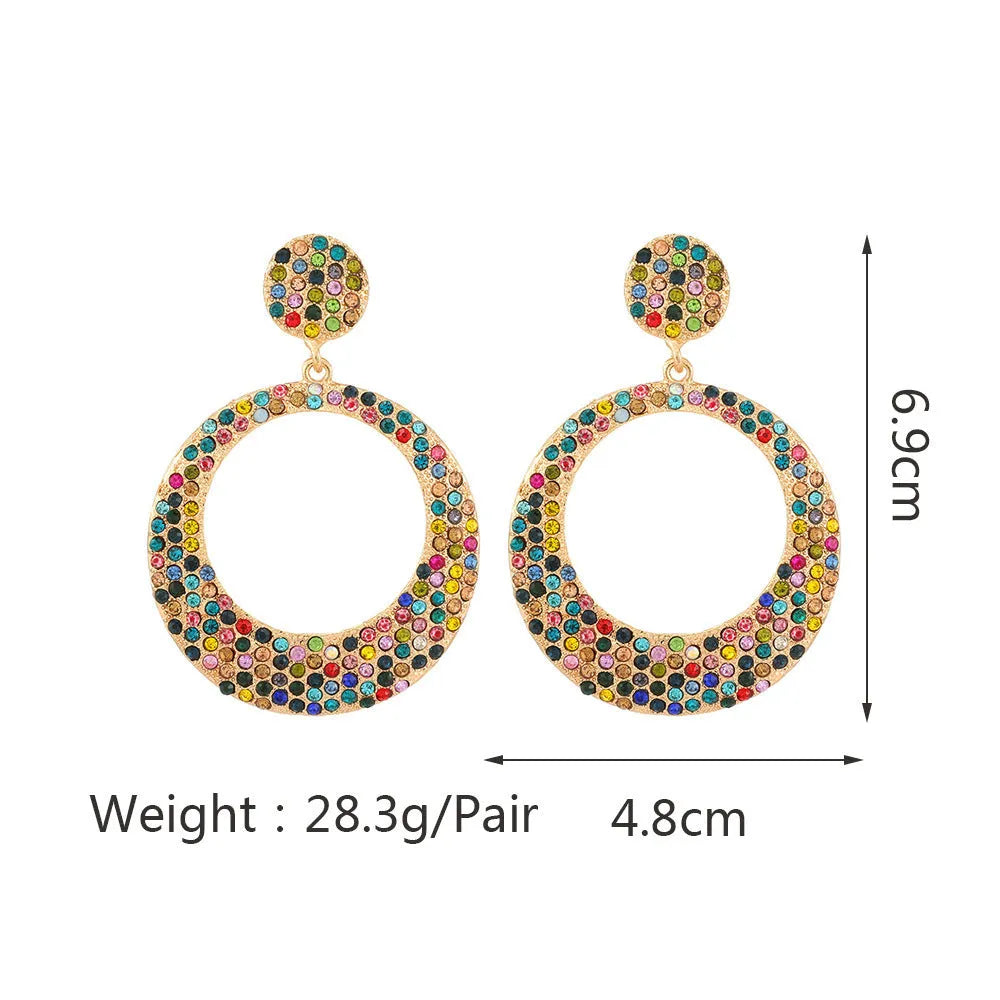 Alloy cartoon pendant earrings with large round coloured pendants and post backs for pierced ears