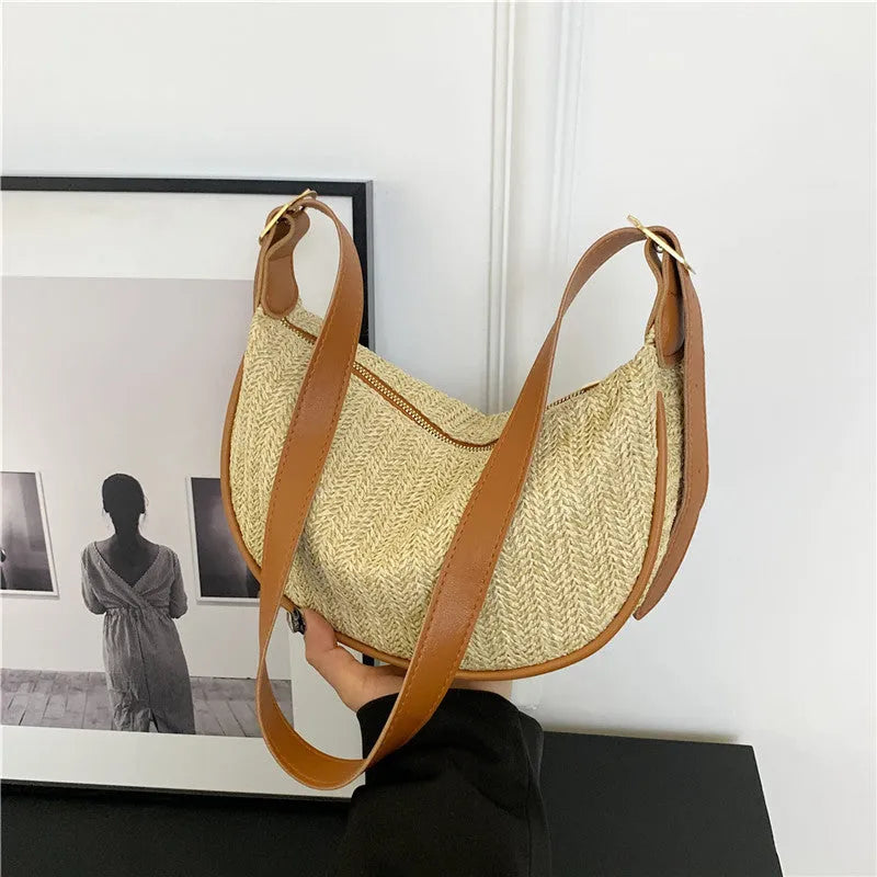 Women's knitted straw woven crossbody bag with single strap in corrugated black or khaki holding phone and files