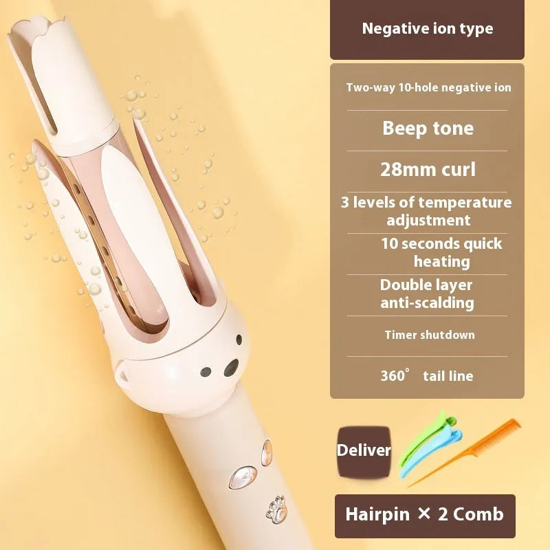 Beige anion automatic hair curler with UK plug on a styling wand.