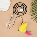 Interactive cat toy hanging on door frame with treat bulb and dangling mouse toy on elastic rope