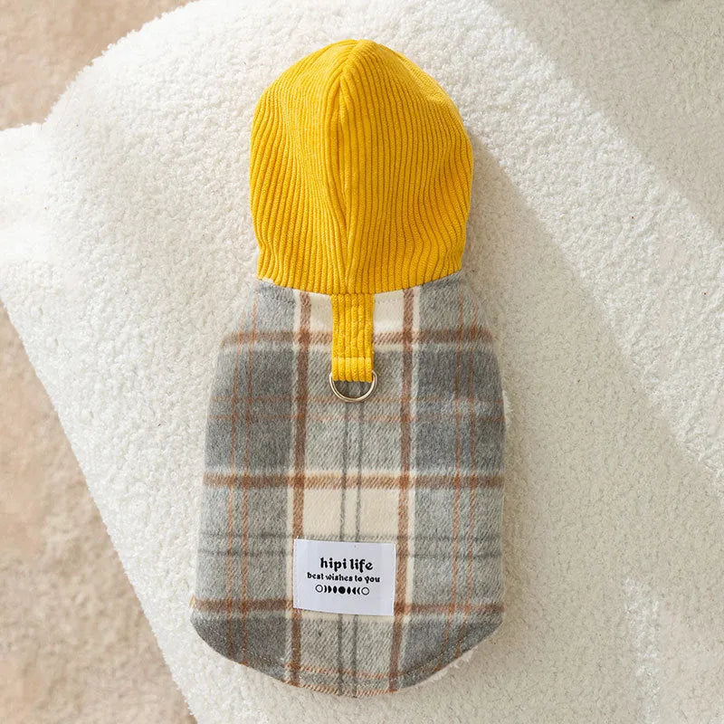 Blue chessboard grid hooded dog vest with traction features on corduroy fabric