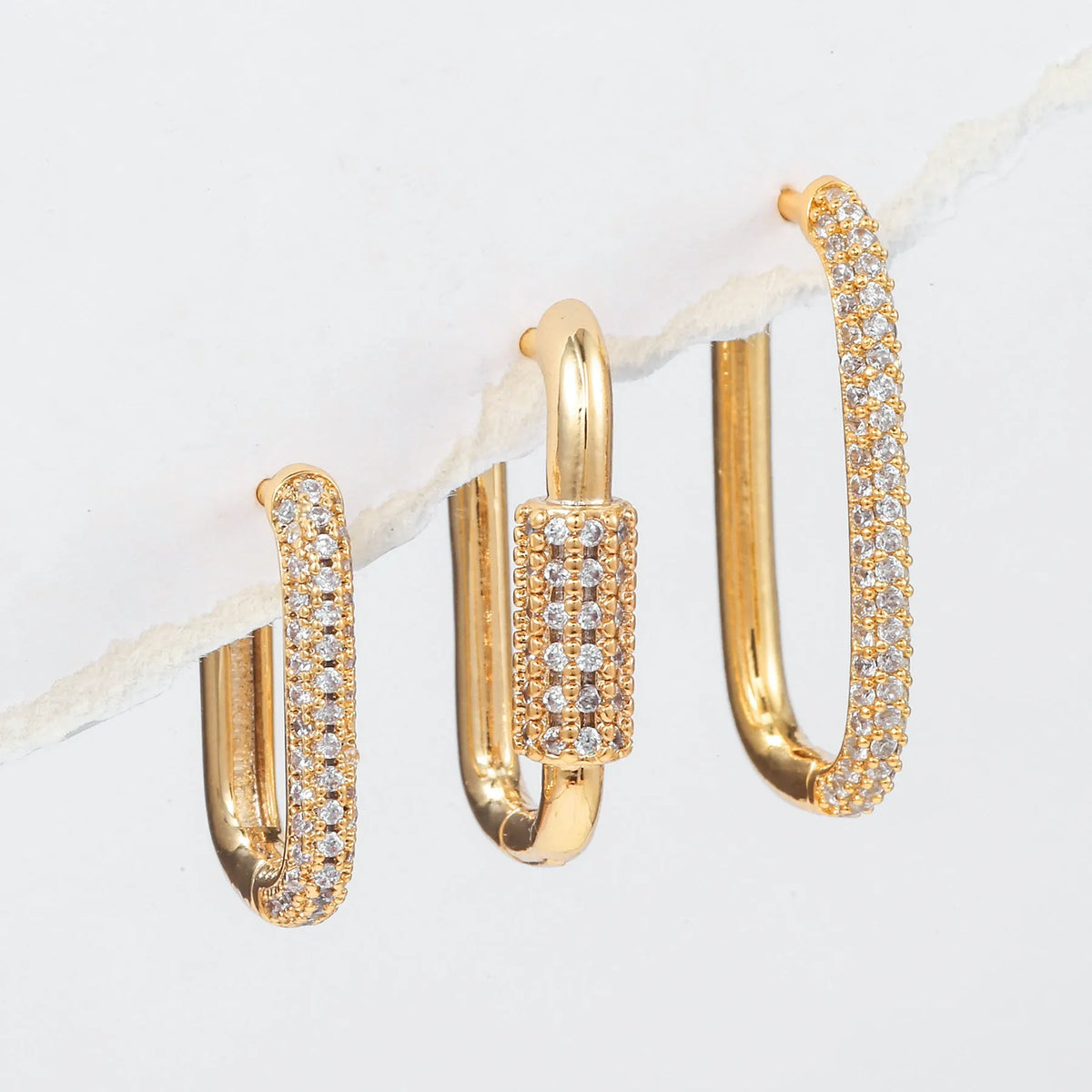 Geometric ear clip set with micro inlaid zircon stones in gold and white finishes
