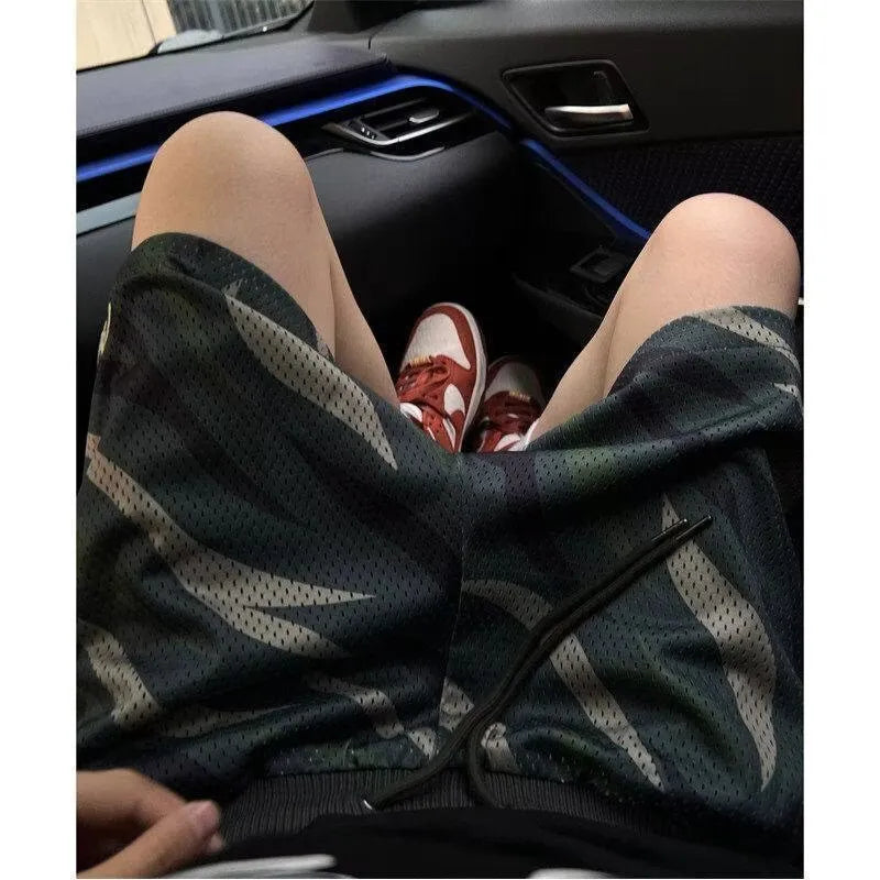 Men's camouflage mesh shorts with straight fit cut in cotton blend polyester fabric