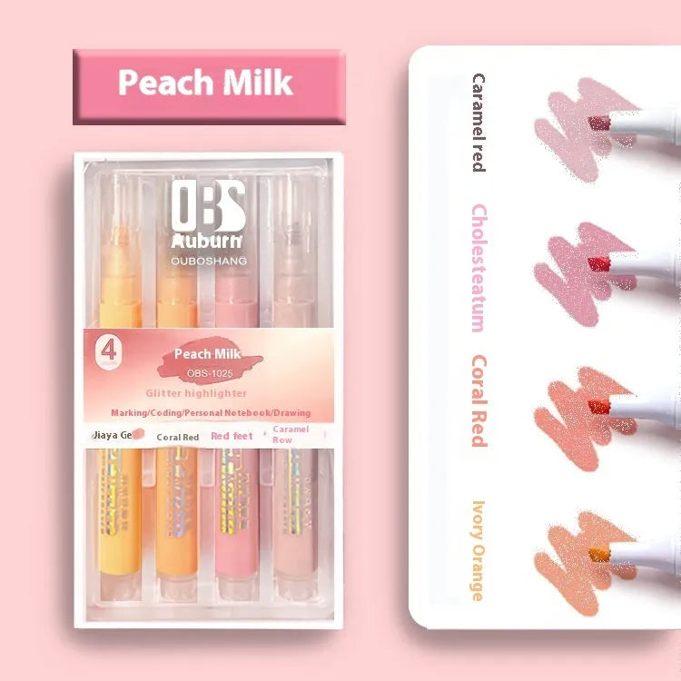 Four glitter fluorescent highlighter pens with slanted tips shown in a set.