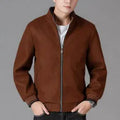 Men's grey polyester fleece sports jacket with long sleeves and a stick pocket.