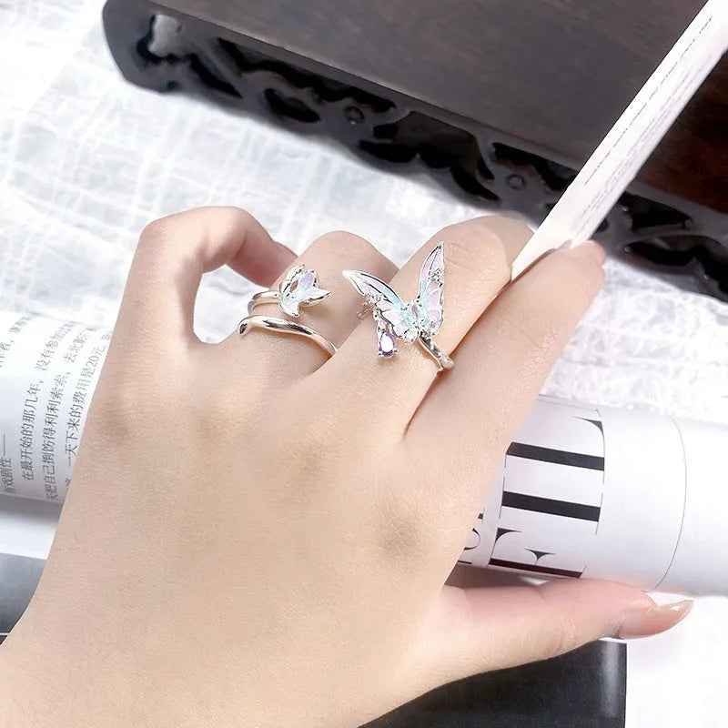 Adjustable copper insect motif ring with textured drip oil finish shown in available colour variations