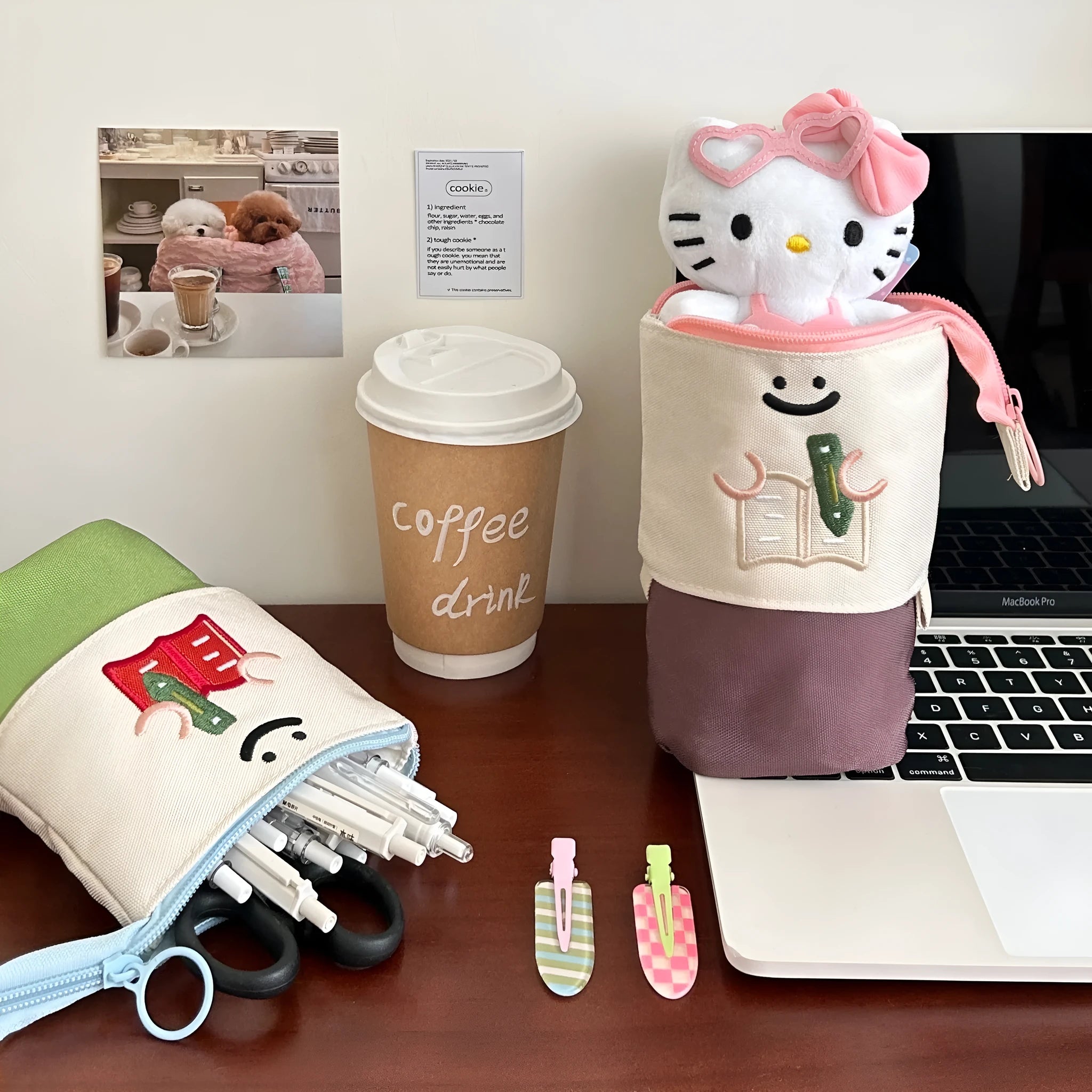 Korean style cartoon collapsible pencil case made from Oxford fabric in brown colour, shown with pens inside.