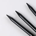 Carbonised pencil suit showing six graphite and three carbonised wooden pencils on suction card packaging