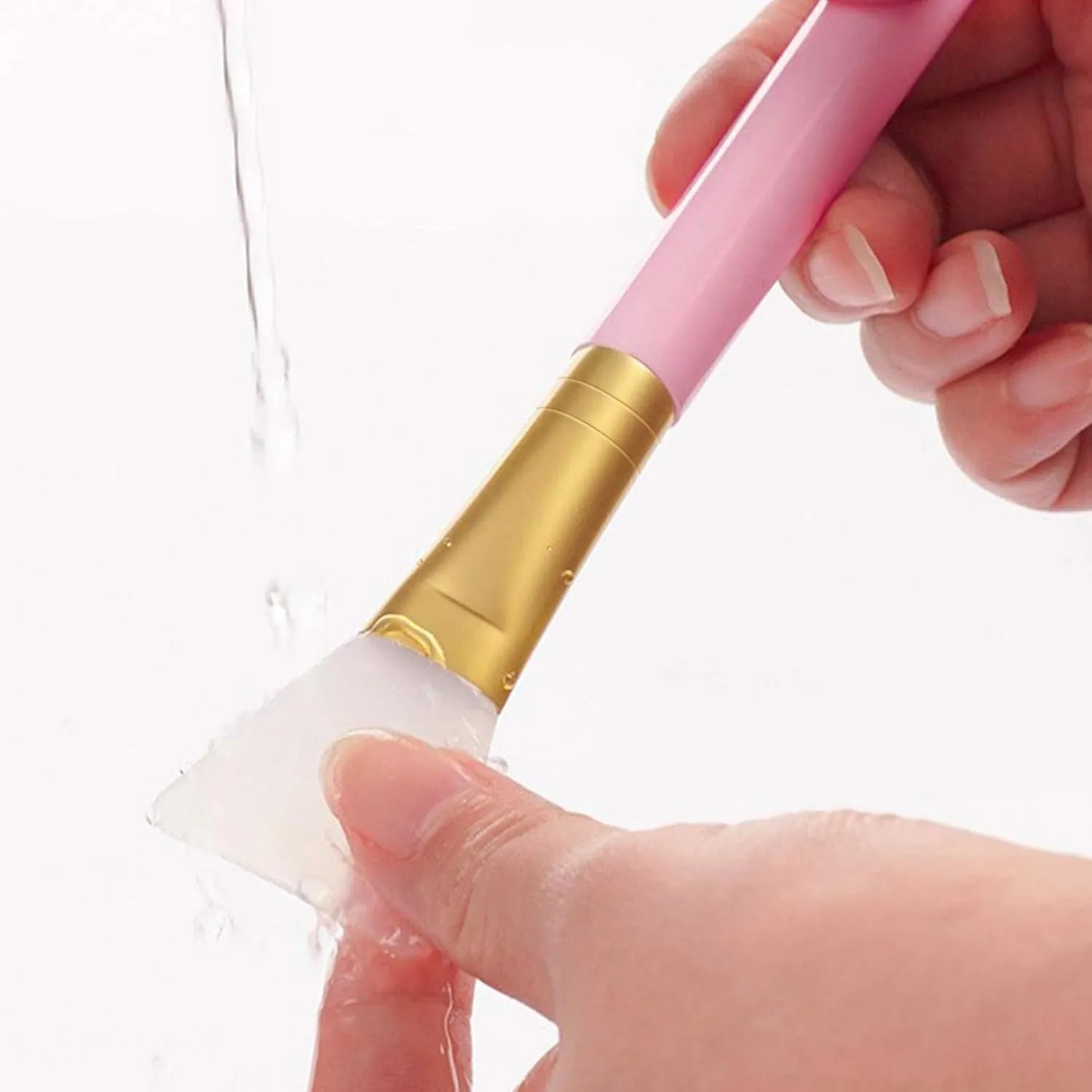 Reusable silicone face and body mask applicator spatula in various colours for applying clay and mud masks.