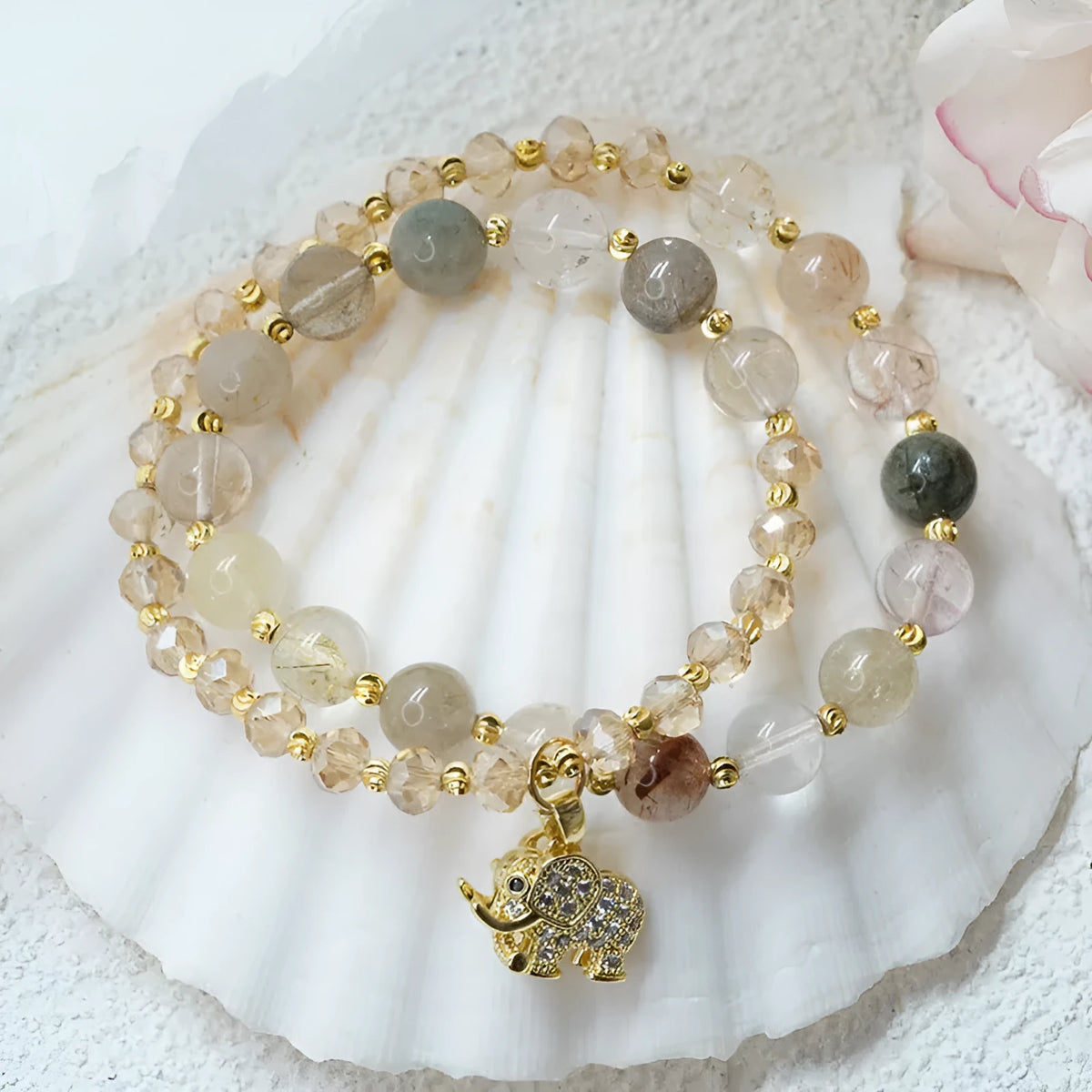 Retro colour hair crystal and strawberry quartz bracelet for women with adjustable ethnic design